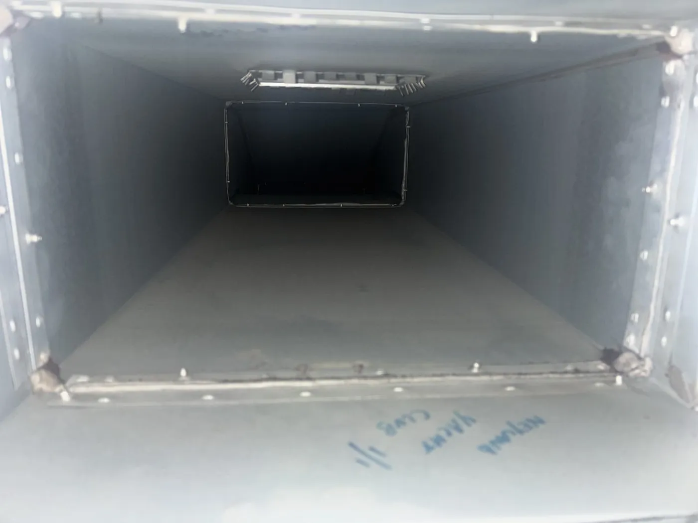 Interior of square kitchen extract ductwork three metres from the canopy after cleaning